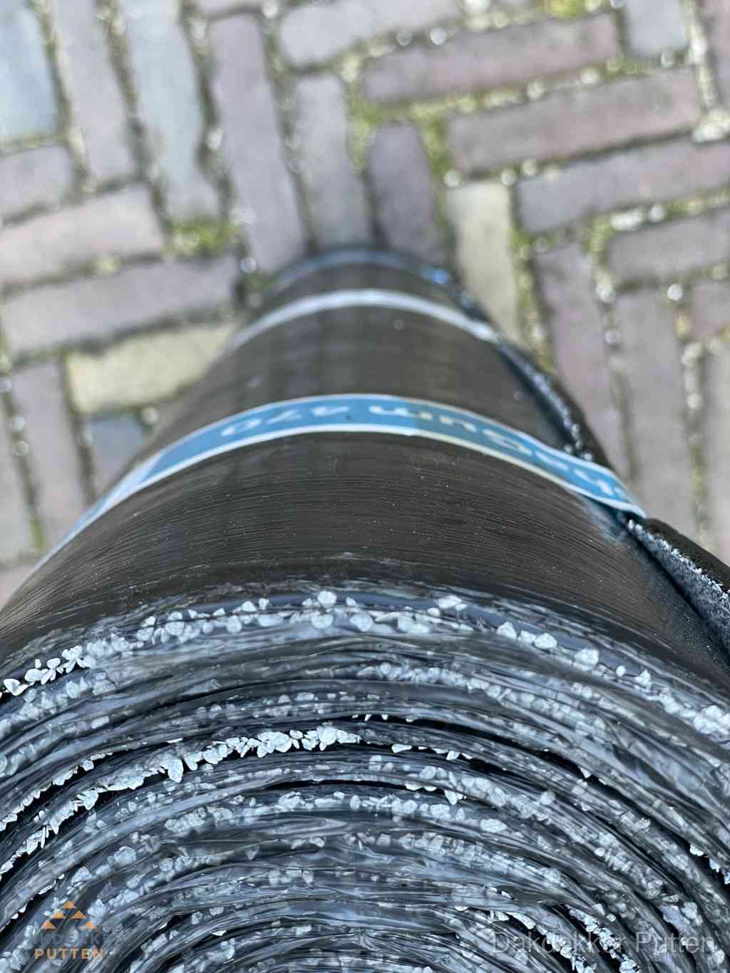 Rol bitumen dakleer met leislag voor plat dak in Putten Rol bitumen dakleer met leislag voor plat dak in Putten